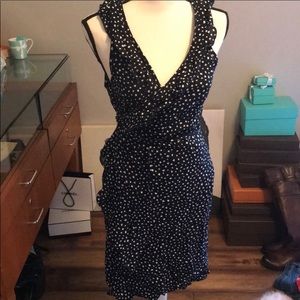 Flirty polka-dot wrap dress with ruffles